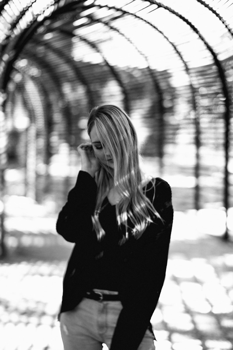 grayscale photo of woman in black long sleeve shirt