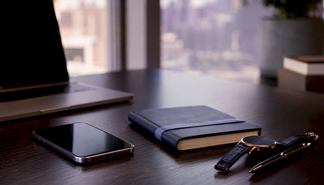 Luxury agent desk with phone and agenda