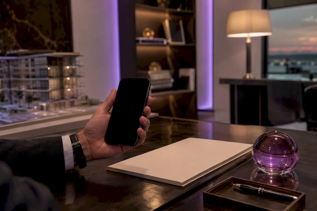 Luxury real estate agent analyzing influencer marketing content