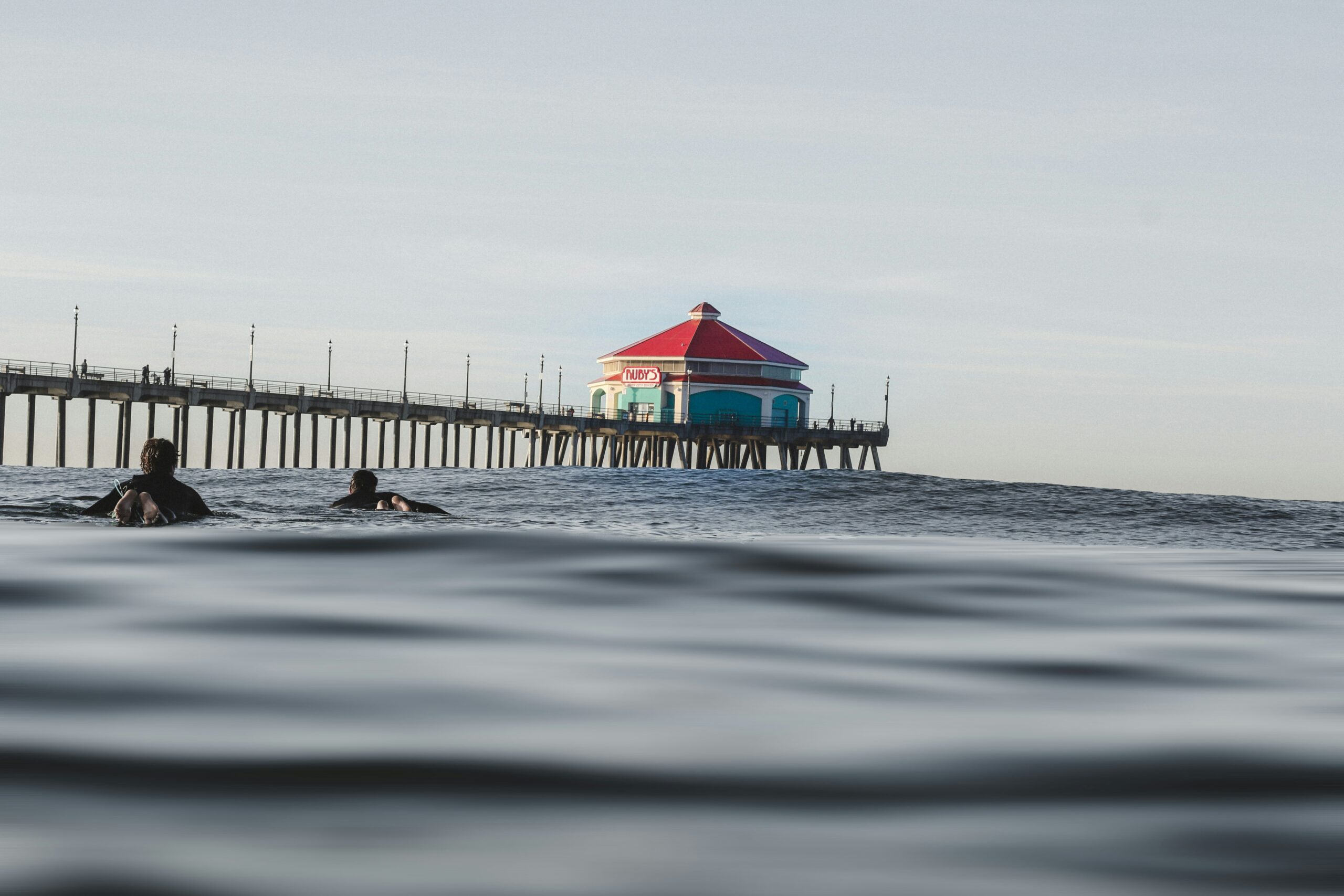 Swimmers and the pier