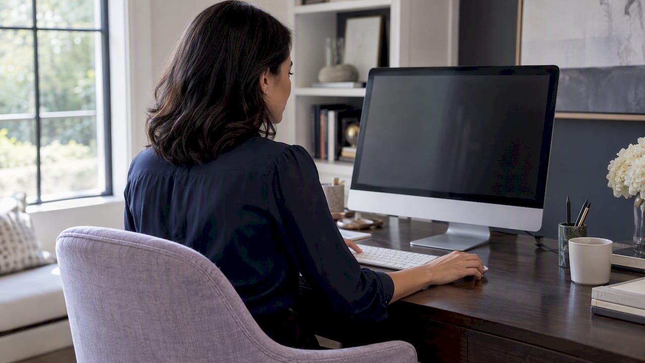 Agent reviewing personal real estate website